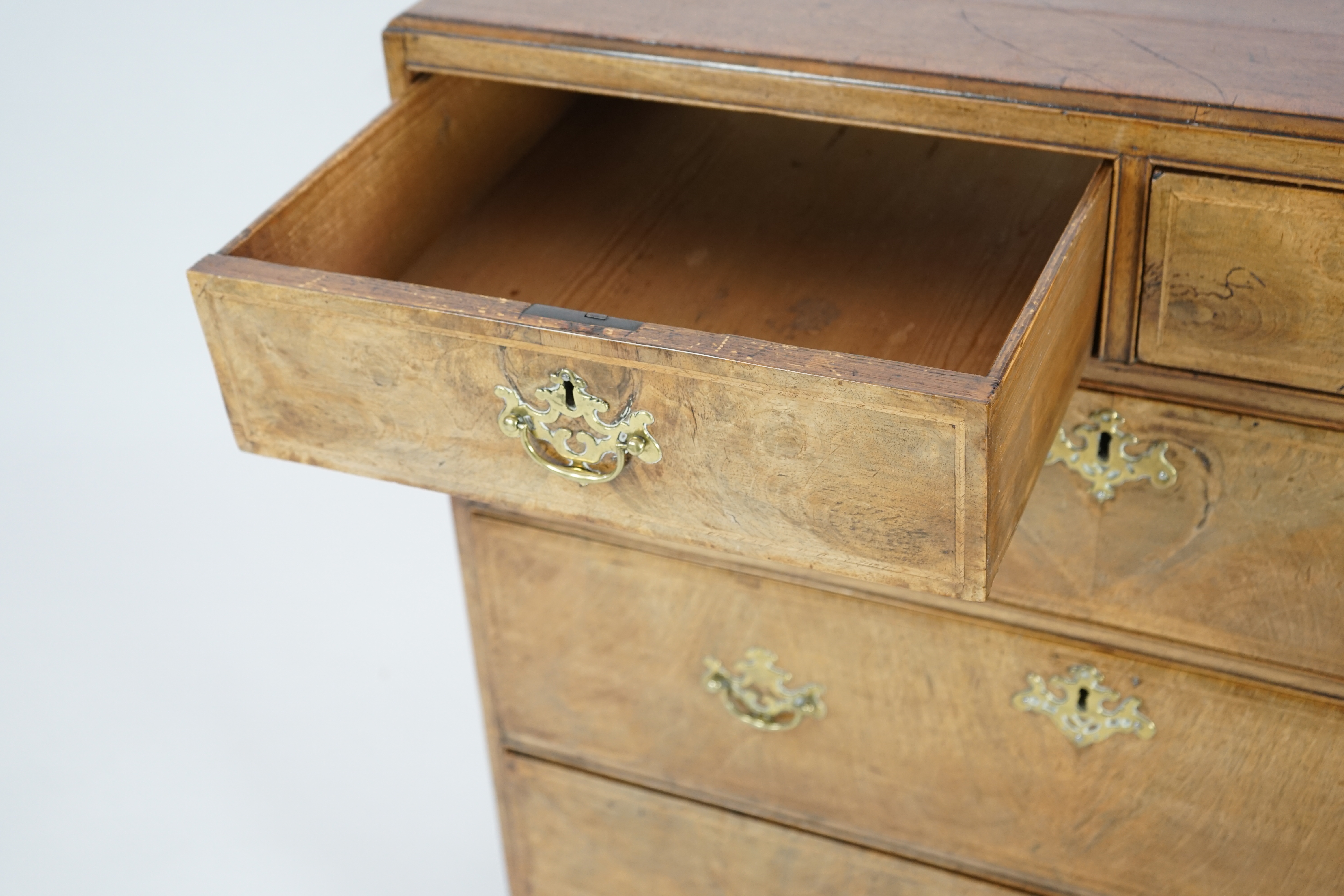 A George II walnut and feather banded caddy top chest